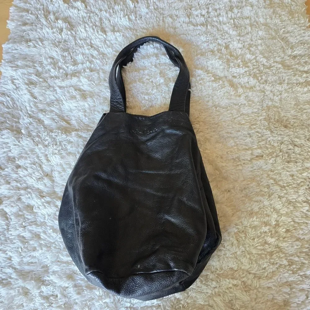 Neta Sade black leather‎ hobo purse.